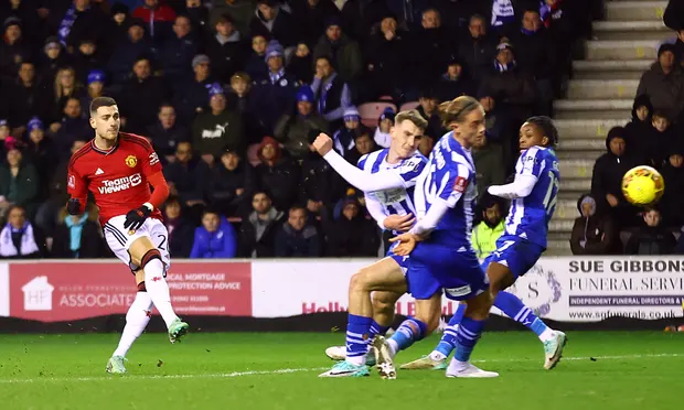 "FA Cup momentum boosted by United's Wigan triumph."